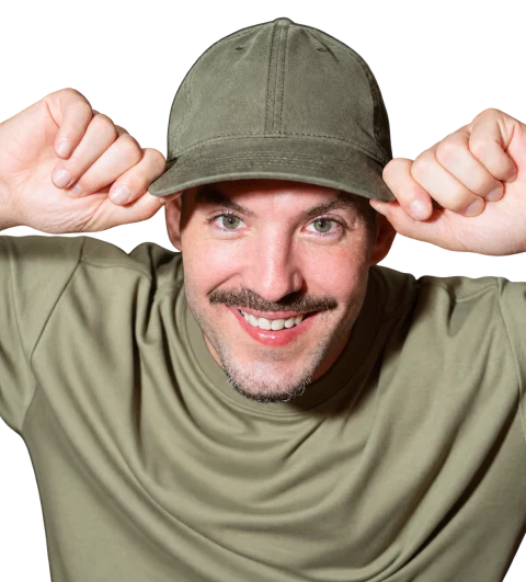Matthew Karsten in an olive cap and olive tee, smiling.